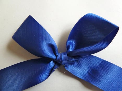 Bright blue fabric ribbon on a white background
