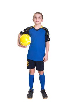 Ten year old boy with a soccer ball isolated on white background.