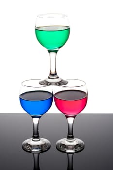 red, green and blue backlit drinks with reflection