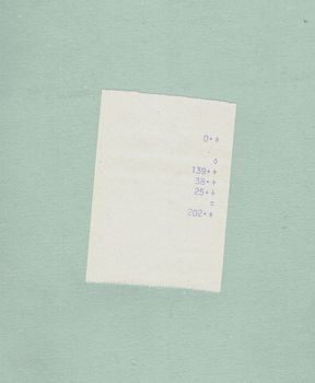 bill or receipt isolated over light blue paper background