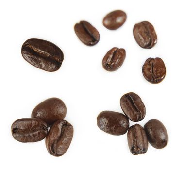 Closeup of coffee beans on plain background