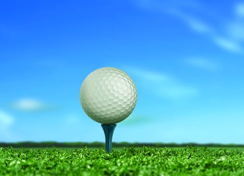 Golf Ball on Tee under Blue Sky