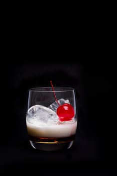 White Russian Cocktail - isolated on black