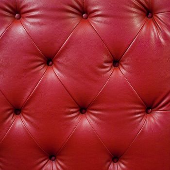 Close up red luxury buttoned black leather