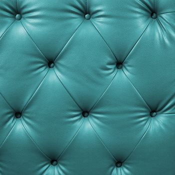Close up cyan luxury buttoned black leather