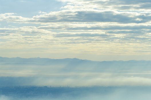 Blue Sky with mountain silhouette