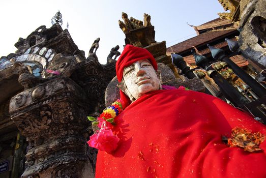 Statue near gate in Wat Lampang Luang north Thailand