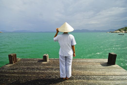 Vietnamese Woman in front of the sea