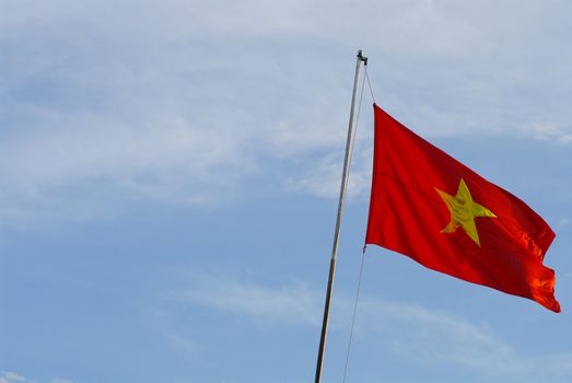 Flag of Vietnam on blue sky