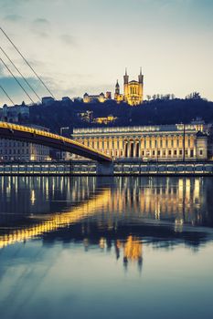 Vertical view of Saone river at Lyon by night, France, special photographic processing