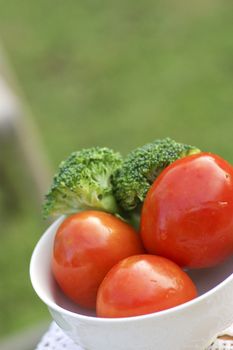 Tomato and Broccoli  in white bowl