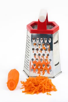Grated carrot on a white background