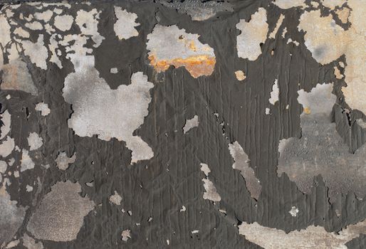 Background image of old flaking paint on metallic surface.