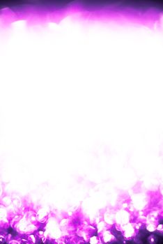 Abstract background of pink holiday lights with copy space.