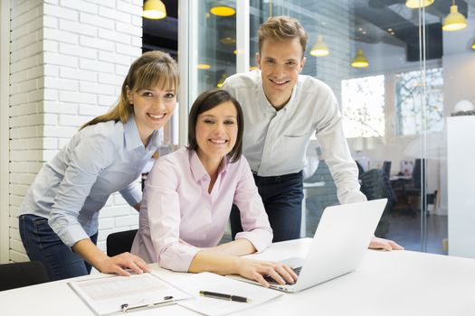 business man woman computer desk office meeting