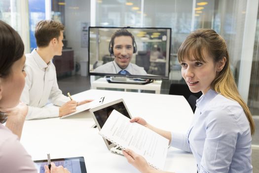 Businesswoman businessman desk chat colleagues