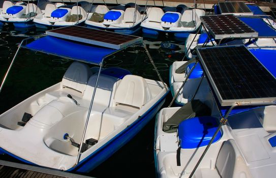 Pedal boats with solar panels at Pregnant Maiden lake, Marble Geoforest Park, Langkawi, Malaysia