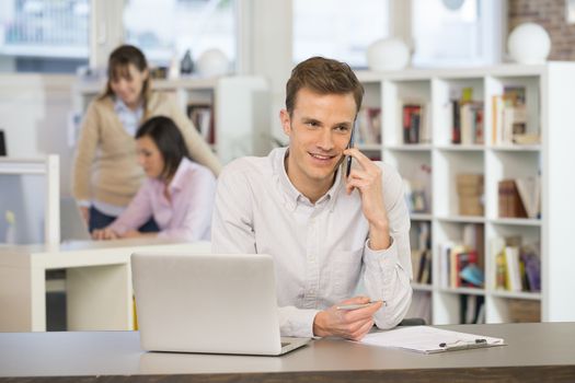 Man Cheerful desk cell phone young