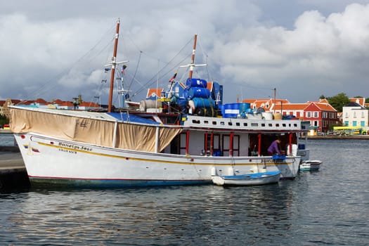 WILLEMSTAD, CURACAO - DECEMBER 10, 2013: Floating Market on the harbor of Willemstad on December 10, 2013 in Curacao, ABC Islands