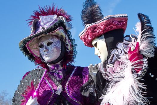 Colorful couple at the 2014 venetian carnival of Annecy, France