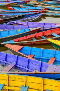 Detail of old colorful sail boats in the lake, Pokhara, Nepal