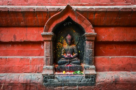 Detail of Buddha statue on Swayambhu temple, Kathmandu, Nepal