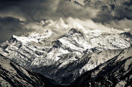 Himalayas mountains monochrome filtered scenic view with dramatic sky, Annapurna area, Nepal