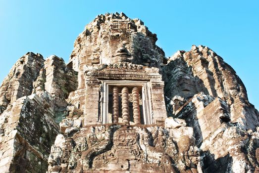 Faces representing the all-seeing Bodhisattva adorn Angkor Thom's towers. 