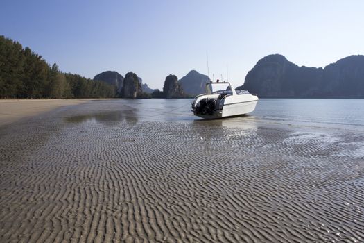 Speedboat on the sand at Rajamangala beach, Trang Province, Thailand