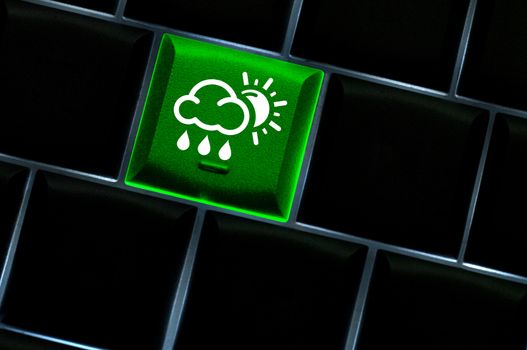 Online weather Concept with back lit keyboard