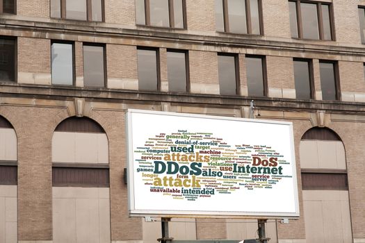 Advertising billboard with DDOS word cloud sign on brick wall background texture