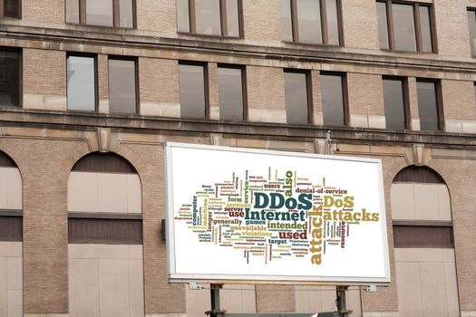 Advertising billboard with DDOS word cloud sign on brick wall background texture