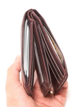 Asian male hand holding a wallet with full of credit cards on white background