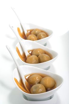 Vietnamese glutinous rice balls dessert on white background