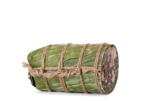 Vietnamese head cheese roll wrapped under banana leaf