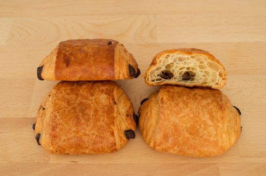 French chocolatine on wooden cutting board