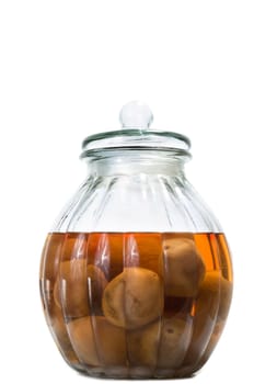 Vietnamese salted and pickled limes in a glass jar