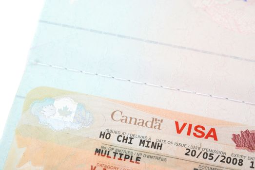 Close up shot of Canadian visa stamp issued in Ho Chi Minh Vietnam