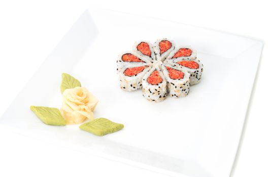 Sushi nicely decorated forming hearts  shapes on white square dish