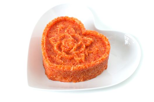 Vietnamese red glutinous sticky rice, xoi gac forming heart shape