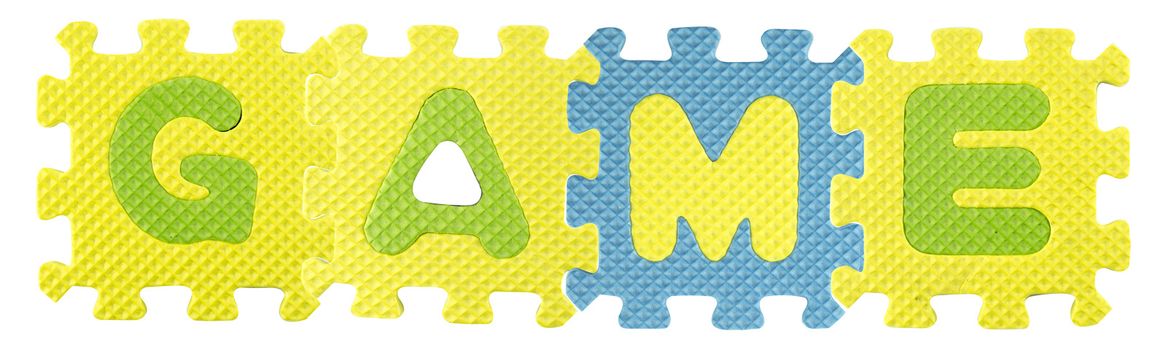 Game word created from Alphabet puzzle isloated on white background , with clipping path.