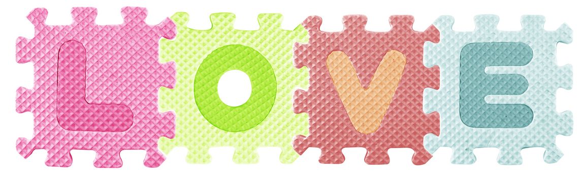 Love word created from Alphabet puzzle isloated on white background , with clipping path.