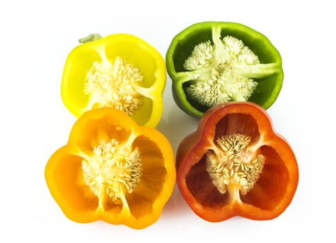 Parts of colorful sweet bell pepper on white background.