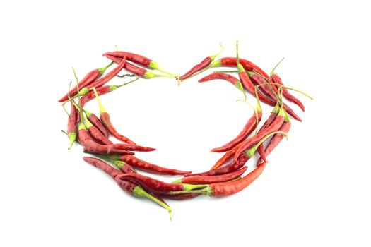 red hot chili pepper make love heart shape on a white background