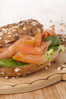 Salmon bagel detail with fresh salmon. Healthy american eating. 