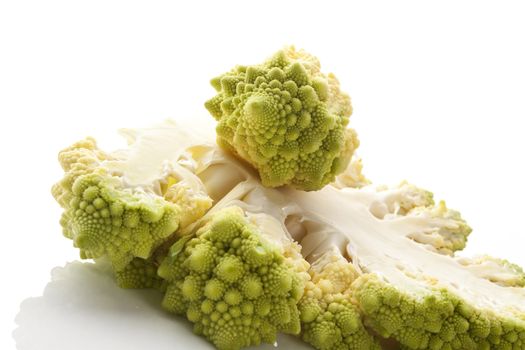 Fresh romansco broccoli detail isolated on white background. Culinary gourmet fresh vegetable eating.