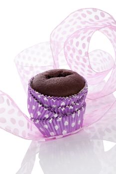 Chocolate cupcake in purple and white. Contemporary modern baking.