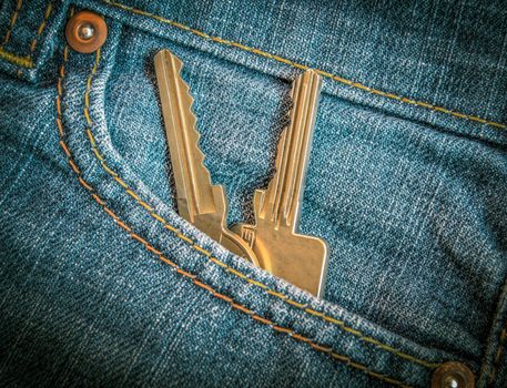Retro FIltered Set Of Apartment Or Car Keys In Jeans Pocket