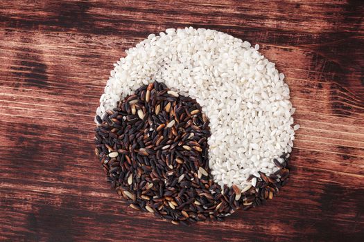 White and wild rice forming Yin Yang Symbol. Healthy balanced cooking. Traditional chinese culture.