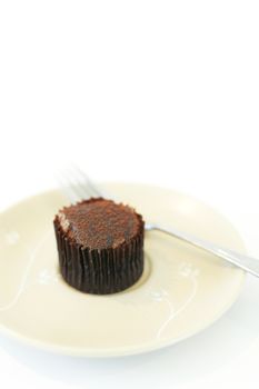 Chocolate cup cake on white dish